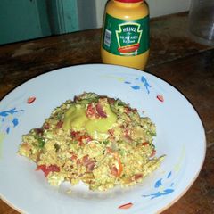 A picture of Spanish omelet with mustard.