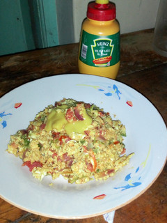 A picture of Spanish omelet with mustard.