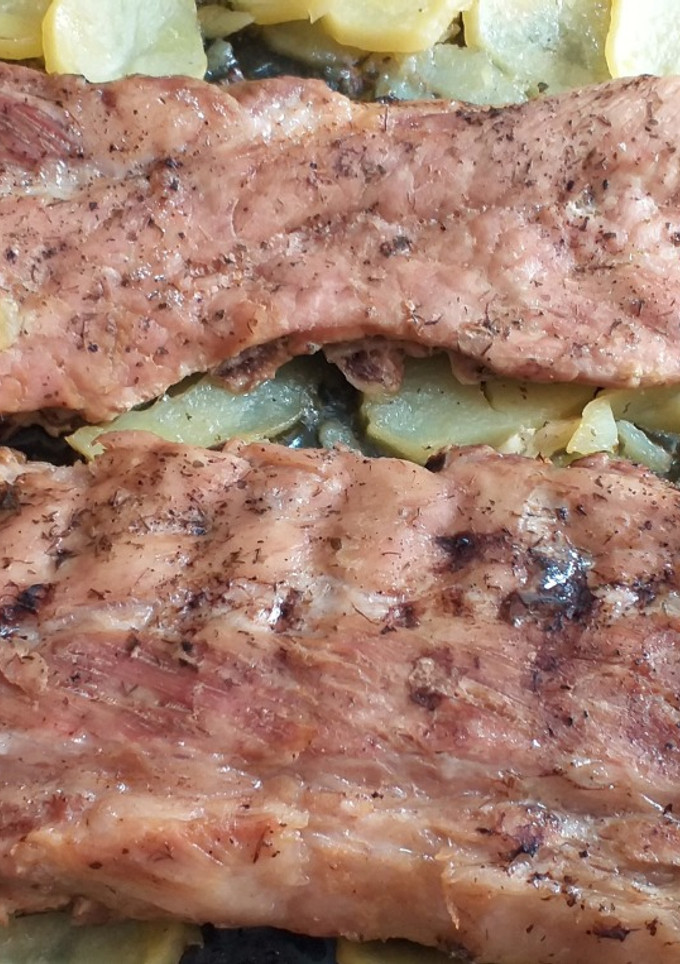 Una foto de Costillas al horno muy tiernas y arromáticas