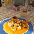 Pollo all'arancia su crema di carote