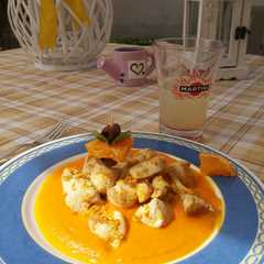 Foto di Pollo all'arancia su crema di carote