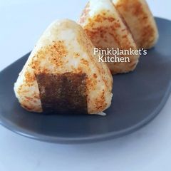 A picture of Yaki Onigiri with Tuna & Cucumber Filling.