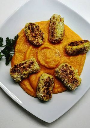 Foto di Crocchette di pesce su vellutata di carote