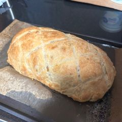 A picture of Beef wellington with handmade puff pastry.