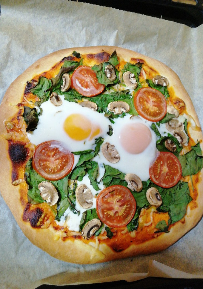 Una foto de Pizza casera de espinacas