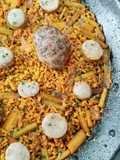 Arroz con figatells, blanquets y ajos tiernos