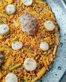 Arroz con figatells, blanquets y ajos tiernos