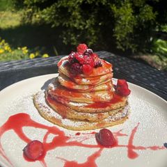A picture of Fluffy Vanilla Pancakes with Berry Compote.