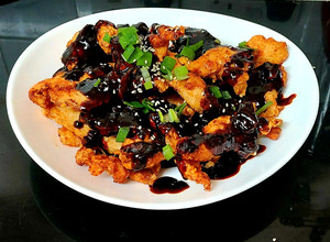 A picture of My Deep fried Chicken with Gochujang Sauce (Korean pepper sauce).