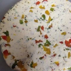 A picture of Homemade mixed herbs and pepper paneer.