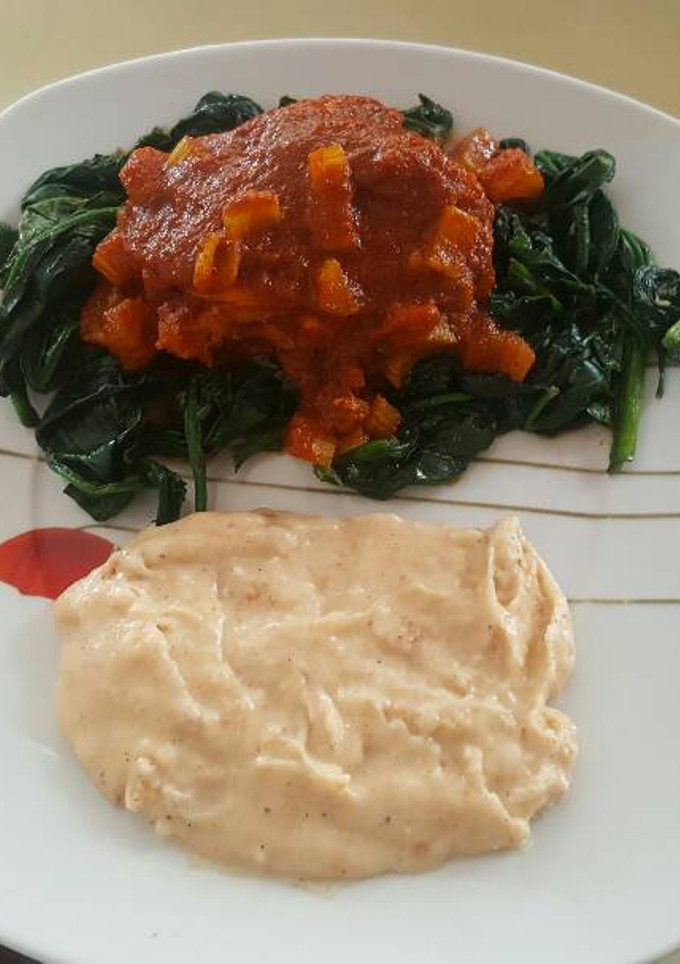 Una foto de Pollo en salsa de chile guajillo jitomate y naranja