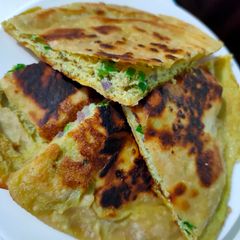 A picture of Egg stuffed paratha.