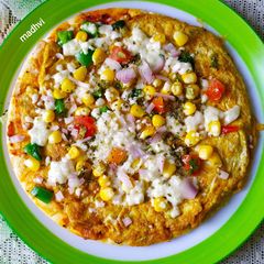A picture of Cheesy Omelette Pizza.