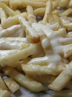 Una foto de Patatas con queso mozzarella al horno
