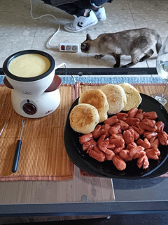Una foto de Fondue de queso