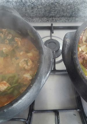 Una foto de Moqueca de langostinos y de pulpo