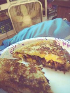 A picture of Bbq pulled pork grilled cheese.