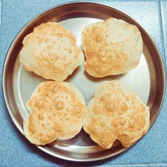 A picture of Chole Poori Bhatura.