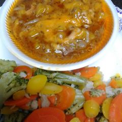 A picture of Butternut squash with beef and onions.