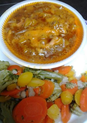 A picture of Butternut squash with beef and onions.