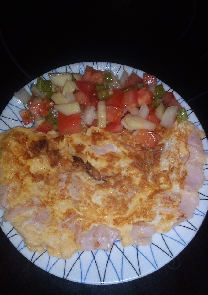 Una foto de Tortilla con fiambre de pavo