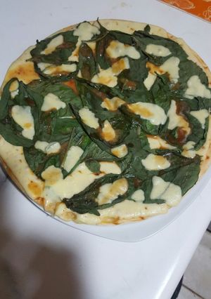 Una foto de Pizza especial margarita