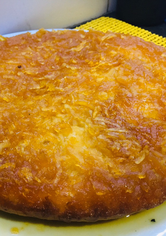 Una foto de Tarta manzanas rallada invertida
