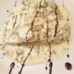 A picture of Chicken Mushroom in creamy sauce.