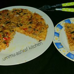 Indomie pizza A picture of Indomie pizza.