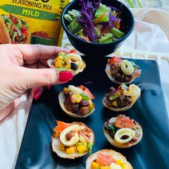 A picture of Mexican Salad in appe tacos.