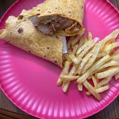 A picture of Chicken Cesar salad wrap.