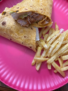 A picture of Chicken Cesar salad wrap.