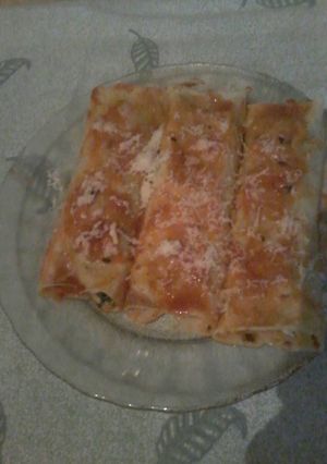 Una foto de Canelones de pollo y espinaca