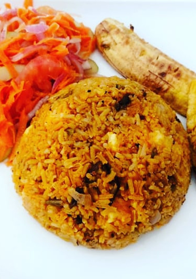 Una foto de Arroz Clavado con queso y longaniza de la casa