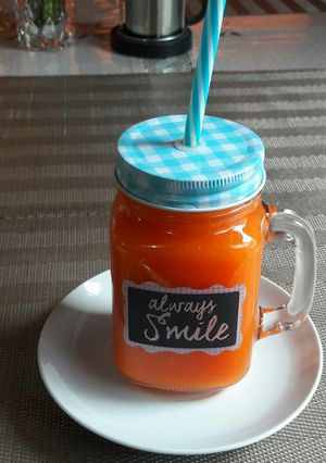 Una foto de Jugo de naranja y papaya🍊