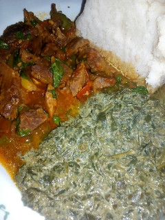 A picture of Wet fried beef,kienyeji veges with ugali.
