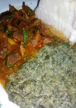 A picture of Wet fried beef,kienyeji veges with ugali.