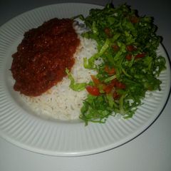 Rice and stew with salat A picture of Rice and stew with salat.