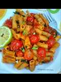 Basil penne pasta in hot tomato sauce