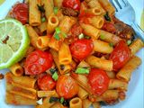 Basil penne pasta in hot tomato sauce