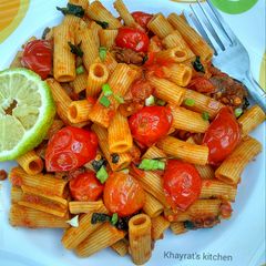 Basil penne pasta in hot tomato sauce A picture of Basil penne pasta in hot tomato sauce.