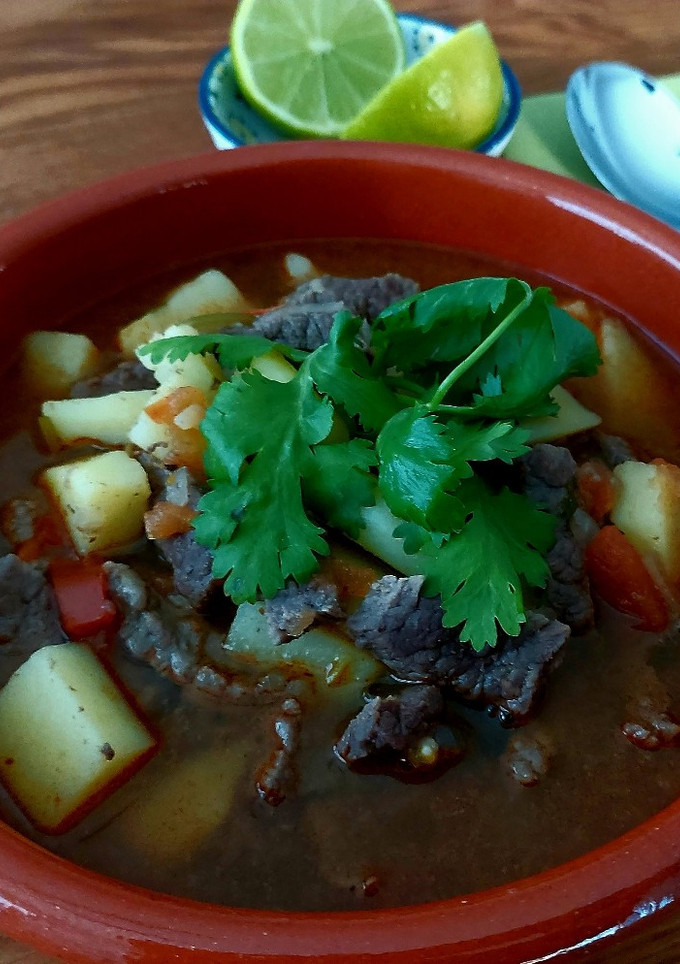 Una foto de Bistec con papas