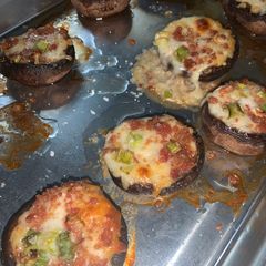 A picture of Garlic butter stuffed mushrooms.