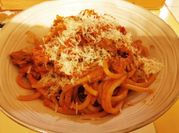 Une photo de sauce tomates oignon