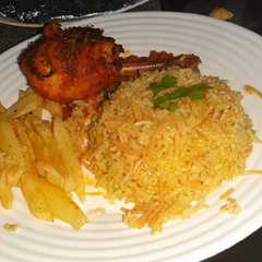 Une photo de Poulet rôti et riz basmati 🙊