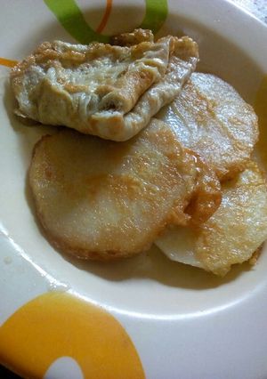 A picture of Fried yam with egg.