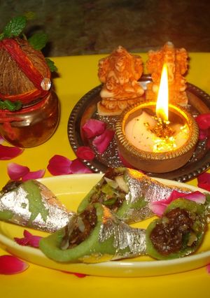 A picture of Gulkand stuffed Pista cones delight.