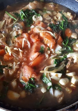 Une photo de Pilons de poulet aux légumes cuits pimentées