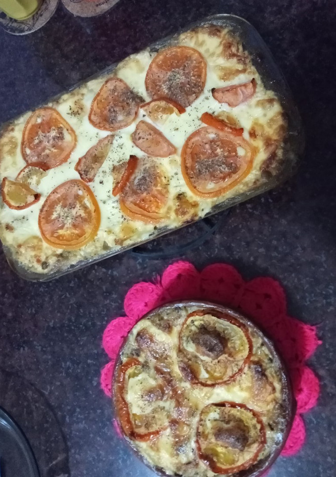 Una foto de Pastel de arroz integral relleno de arvejas y ricotta cremosa