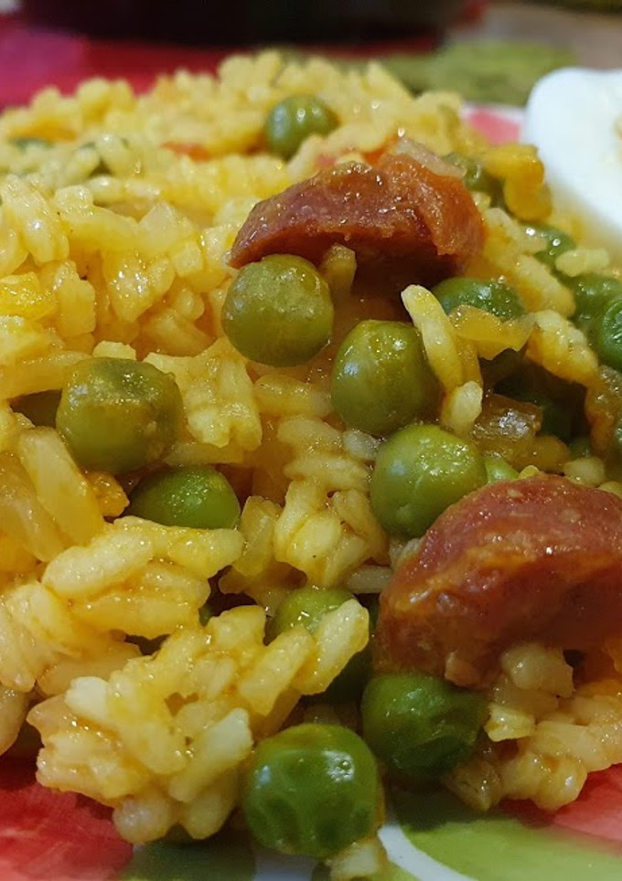 Una foto de *Arroz con cúrcuma y guisantes*